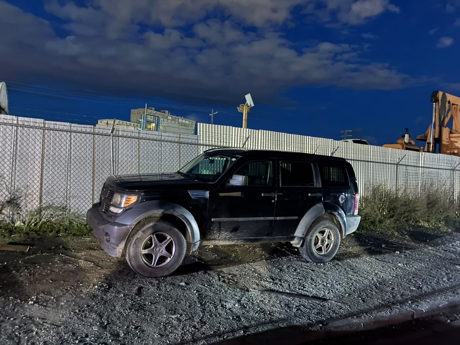 SUV ready for pickup from a Calgary work yard
